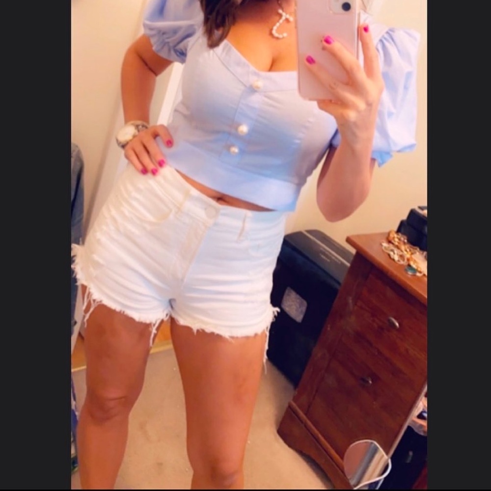 Express white denim high rise shorts with frays and rips